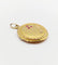 Pendentif Pendentif porte-photo antique fleur en or 18k avec diamant et rubis vers 1910 58 Facettes A06431