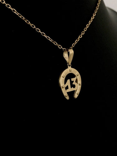 Pendentif Pendentif fer à cheval en or jaune 58 Facettes