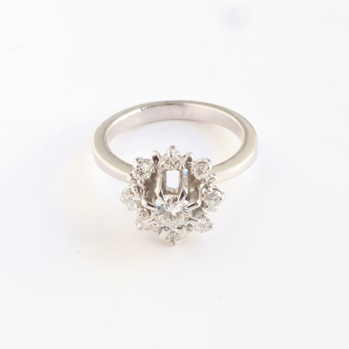 Bague Bague vintage en or blanc sertie de diamants, ornée d'une rosette. 58 Facettes 158/23