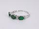 Bague Bague en or blanc avec diamants et émeraude 58 Facettes 2126