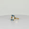 Bague Bague en or jaune 14 carats avec topaze bleue taille émeraude de 2 carats 58 Facettes 2508099