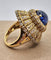 Bague Bague vintage style trombino avec diamants saphir cabochon en or jaune 18 carats 58 Facettes