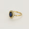 Bague 57,5 Bague marguerite en or jaune et or blanc, saphir et diamants 58 Facettes B250589