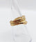 Bague 54.5 Bague serpent or rose finement tressée yeux rubis 58 Facettes A04370