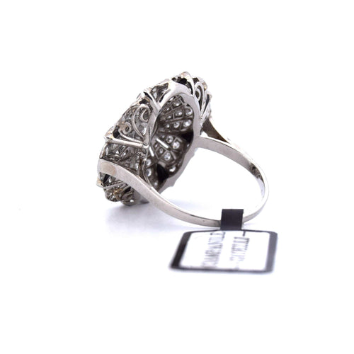 Bague Bague en or blanc ornée d'un travail ajouré spécial 58 Facettes