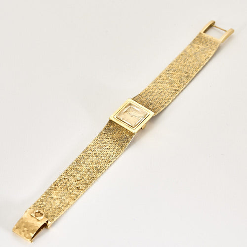 Montre OMEGA - Montre bracelet de dame 2 tons d'or (750) satiné, de forme carrée à mouvement mécanique. 58 Facettes RAM3009