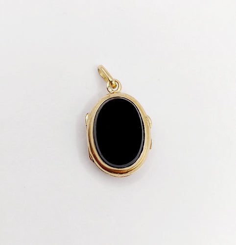 Pendentif Pendentif porte-photo or jaune et onyx (circa 1900) 58 Facettes A05916