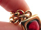 Collier collier POMELLATO pendentif croix grenats + chaine en or 18k 81gr 58 Facettes 267203