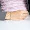 Bracelet Bracelet en or jaune, saphir, topaze rose, émeraude et diamant 58 Facettes PER1612