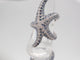 Bague 52 Bague étoile de mer or blanc 18 carats saphirs et diamants 58 Facettes