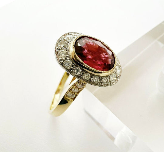 Bague 55 Bague vintage en or jaune avec halo de rubellite et de diamants. 58 Facettes 50347