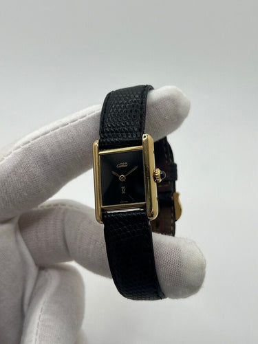 Montre Cartier - Montre Tank Must Vermeil cadran noir 20 x 28 mm 58 Facettes