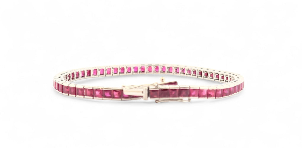 Bracelet Bracelet tennis en or blanc 18 carats et rubis 58 Facettes