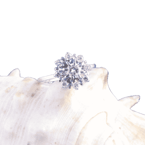 Bague Bague vintage en or blanc sertie de diamants, ornée d'une rosette. 58 Facettes 158/23