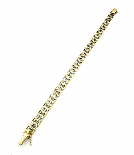 Bracelet CARTIER. Collection "Panthère", bracelet or jaune et acier (full set) 58 Facettes