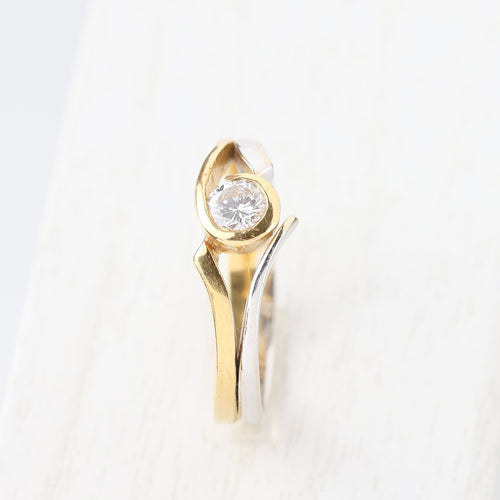 Bague Bague solitaire bicolore avec diamant taille brillant 58 Facettes 129595