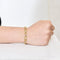 Bracelet Bracelet or jaune et gris, perles et diamants 58 Facettes ENG10572