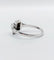 Bague 53 Bague art deco or blanc 18k ornée d'un diamant rond dans une monture géométrique finement travaillée (circa 1930) 58 Facettes A04979