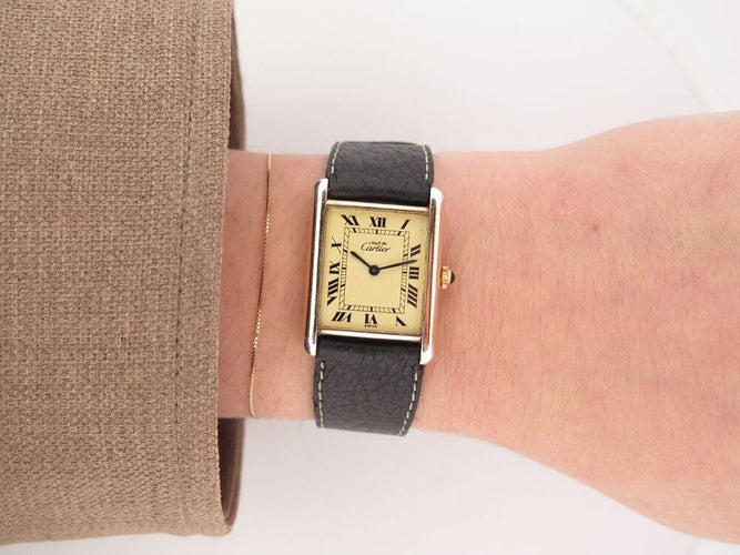 Montre vintage montre must de CARTIER tank 30 mm mecanique vermeil dore en 58 Facettes 266183