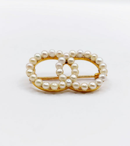 Broche Broche antique or jaune cercles infini et perles 58 Facettes A05616
