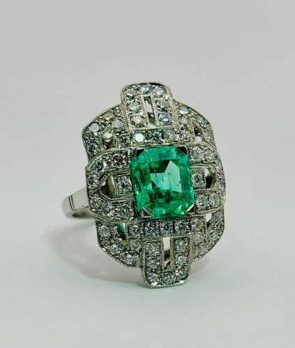 Bague 52 Bague vintage en platine avec émeraudes et diamants 58 Facettes 50327