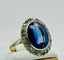 Bague 59 Bague ancienne en or jaune et platine avec un saphir et des diamants 58 Facettes 50270