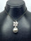Pendentif Pendentif en or blanc, perle de Tahiti et diamants 58 Facettes AB606