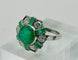 Bague Bague vintage en platine ornée d'émeraudes et de diamants 58 Facettes 50265