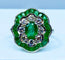 Bague Bague marguerite en or blanc 18 carats en émeraudes et diamants 58 Facettes AB216
