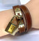 Montre Montre Hermès «  Kelly », cadran PM plaqué or, double tour cuir marron 58 Facettes AB453