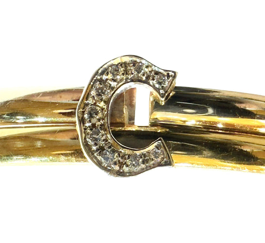 Bracelet Bracelet Cartier vintage double C , 2 ors et diamants 58 Facettes