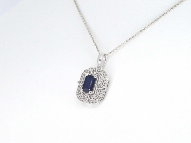 Pendentif Pendentif en or blanc avec diamants et saphir 58 Facettes 2350