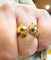 Bague Cartier - Bague Panthère or jaune émeraudes et onyx 58 Facettes