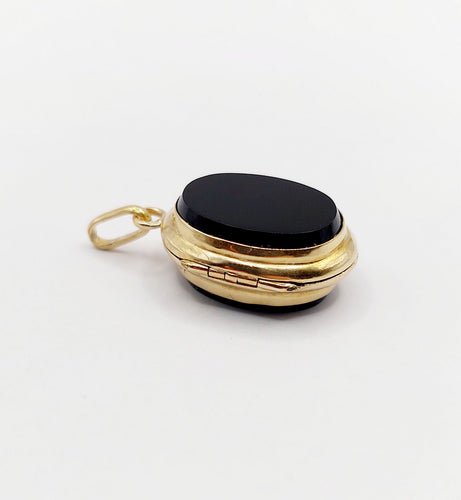 Pendentif Pendentif porte-photo or jaune et onyx (circa 1900) 58 Facettes A05916