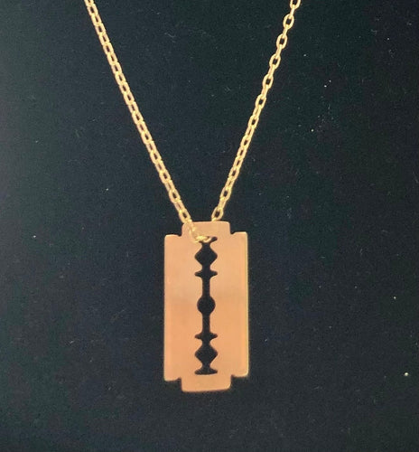 Pendentif Pendentif DINH VAN lame de rasoir or jaune 58 Facettes