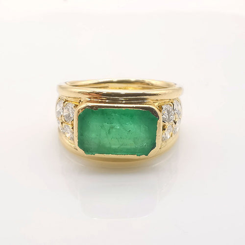 Bague 58 Bague en or jaune, émeraude et diamants 58 Facettes