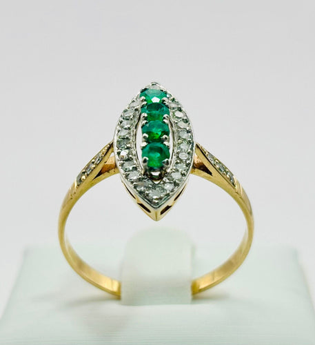 Bague Bague marquise ornée d'émeraudes et de diamants 58 Facettes 50264