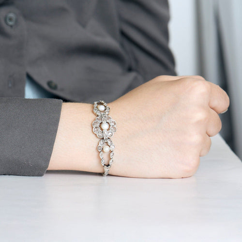 Bracelet Bracelet en or blanc, perles et diamants 58 Facettes LJ31