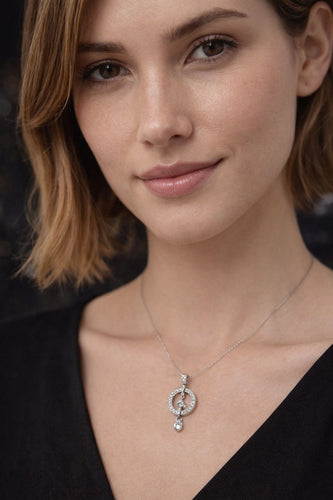 Pendentif Pendentif circulaire en diamant avec motif de pendentif articulé 58 Facettes 50374