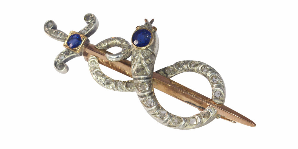 Broche Broche antique en or, diamant et saphir, serpent enroulé autour d'une épée ou d'un poignard 58 Facettes 22297-0136