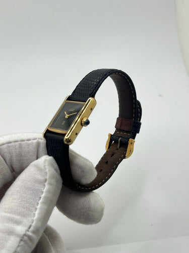 Montre Cartier - Montre Tank Must Vermeil cadran noir 20 x 28 mm 58 Facettes