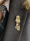 Broche Broche passementerie or jaune rubis calibrés 58 Facettes 1159.3