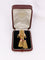 Broche Broche passementerie or jaune rubis calibrés 58 Facettes 1159.3