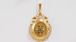 Pendentif Pendentif porte photo en or jaune et émeraude 58 Facettes 32604
