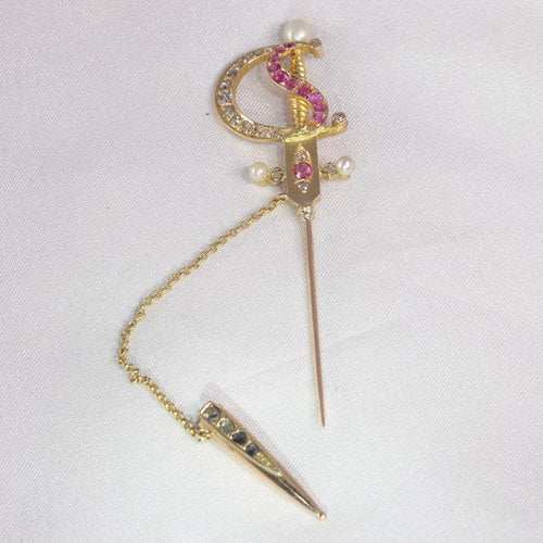 Montre Épingle en or antique en forme d'épée ornée de bijoux 58 Facettes 21092-0169