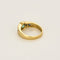 Bague en or jaune, émeraude et saphirs calibrés de synthèse