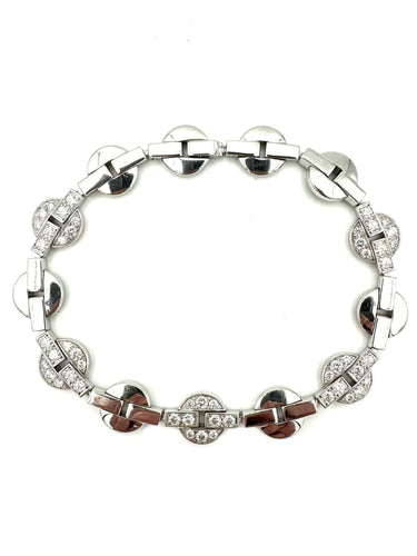 Bracelet CARTIER. Collection "Himalia", bracelet or blanc 18K et diamants 58 Facettes
