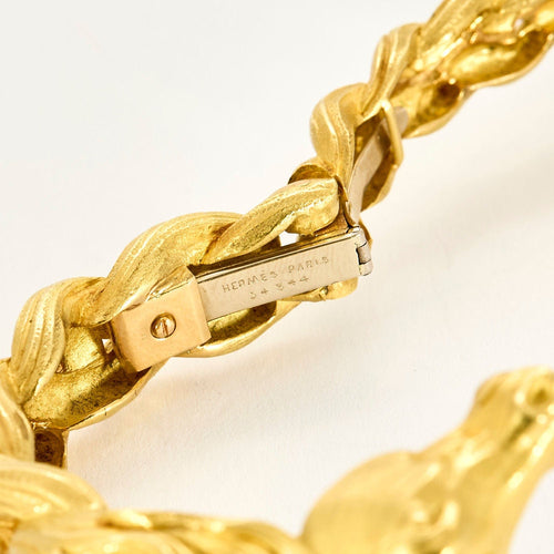 HERMES - Bracelet jonc en or jaune a motif de cheval