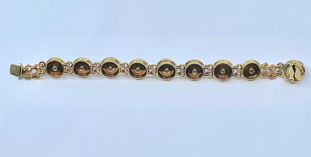 Bracelet Bracelet en or 18 carats sertie de 9 améthystes en cabochon 58 Facettes AB88