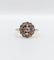 Bague 53.5 Bague marguerite circa 1910 en or 18k, platine et diamants 58 Facettes A06629